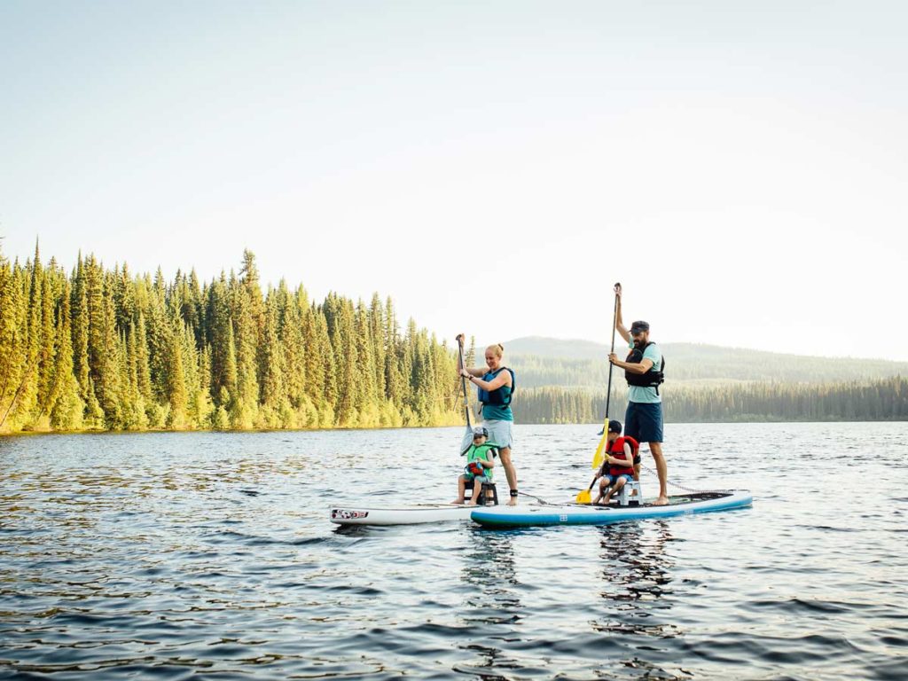Family On Paddleboards In Rossland.