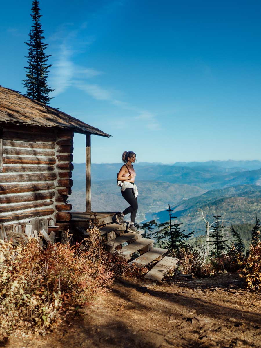 Lady Coming Out Of A Cabin In Yoga Clothes.