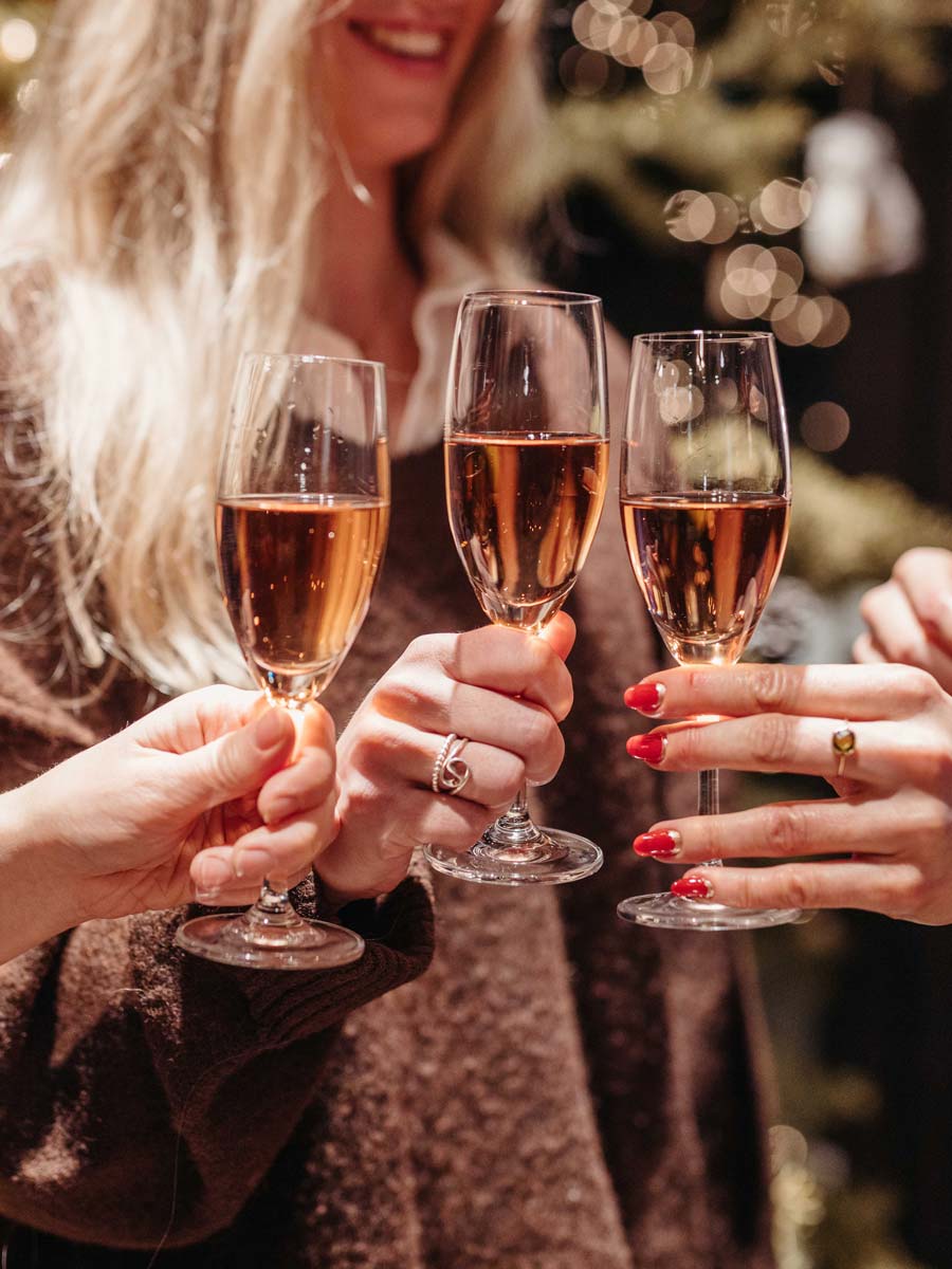 Friends Toasting With Champagne.